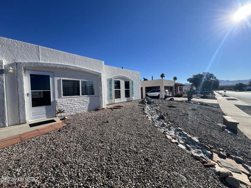 This property - is the one you're looking for!!! Built in 1977, this 3 bedroom 2 bathroom home is 1577 sq ft. extremely well cared for home features, 2 car garage with shelves, upgraded flooring, newer paint, big backyard with a view, mud room, and an Arizona room.