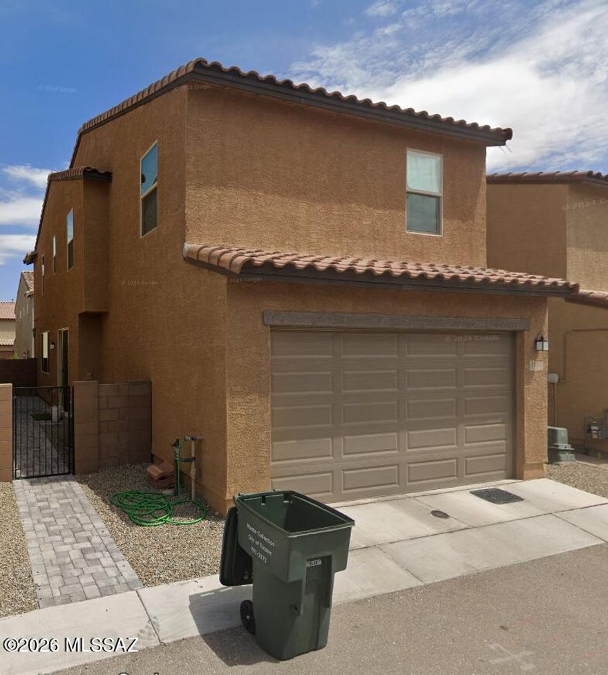Welcome to this beautiful 4-bedroom, 2.5-bath home located in the vibrant city of Tucson, AZ. This two-story home boasts a spacious layout with a 2-car garage for your convenience. The kitchen is a chef's dream, equipped with modern stainless steel appliances, a breakfast bar for casual dining, and a generous walk-in pantry for all your storage needs. The home's location is a major plus, being in close proximity to the University of Arizona, downtown, and a variety of shopping centers. The property also features a fenced side yard, providing a secure outdoor space for your enjoyment. This home is a perfect blend of comfort, style, and convenience. Don't miss out on this gem in the heart of Tucson! Only small dogs permitted. W/D for convenience only.
