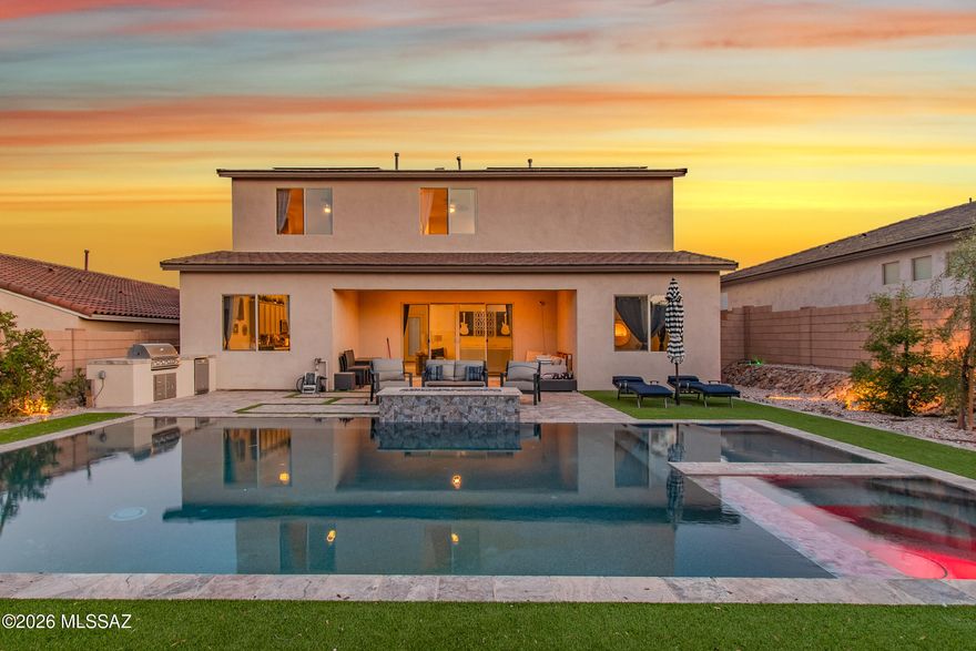 This yard is ready for your desert mornings, summer BBQ's, & evening sunsets! This stunning, nearly new 5-bedroom + den home just under 3,000 sf with a 3 car tandem garage in a sought after Vail community already has what builders can't give you-a spectacular resort-style backyard oasis! Enjoy the sparkling resort-style pool & spa and built in grill, entertain on the artisan paver patio, & enjoy lush turf that stays magazine-worthy year-round. Inside, the oversized open & light-filled floor plan impresses with modern finishes and space for every need-including a loft & home office or flex room. Everything is done and done beautifully. Just move in and start living the Arizona luxury lifestyle you deserve. Schedule your private showing today before someone else claims this paradise. With multiple bathrooms and flexible living spaces, this home provides comfort and versatility for a variety of lifestyles. The primary suite serves as a private retreat, while additional rooms can be used for bedrooms, office space, or guest accommodations.
Situated on an approximately 8,838 sq ft lot, the property offers plenty of outdoor space with potential to customize your ideal backyard oasis. A 3-car garage provides ample parking and storage. Located in a growing area of Vail, this home offers a peaceful setting while still being within reach of shopping, dining, and top-rated schools. Don't miss the opportunity to own a beautifully built home in one of the area's most desirable communities.