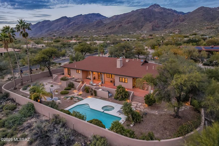 Price reduced $40,000! Charming and updated 3BR w/den custom home in very desirable foothills location. Private acre lot within walking distance to Sabino Canyon, Catalina Foothills Schools & offers WONDERFUL mountain and city views! Spacious family room w/cozy fireplace. Separate living room. Remodeled kitchen w/custom cabinetry and SS appliances. Spacious primary suite. 2.5 updated bathrooms. Beautiful Italian porcelain tile floors. Pella windows. Solid wood doors. Freshly painted. Enjoy the resort like rear yard w/refreshing pool & spa, expansive covered patios, lush landscaping and amazing views. Truly SPECIAL location! Walk to Sabino Canyon with miles of hiking & biking. Canyon View Elementary and Esperero Middle School a short walk away. No HOA! Back on market due to buyer's remorse. Please use Agave Title, Kelly Ladrido Escrow Officer. 520-918-1683. Kellyl@agavetitle.com. Title Commitment has been received. Please include at least 2% in earnest money with any offer.

See attached documents AOD, SPDS and for approx. $20,000 in recent improvements. Note the HVAC units are older but function properly. See Frost Mechanical inspection and estimate for new HVAC units (only $12,000).