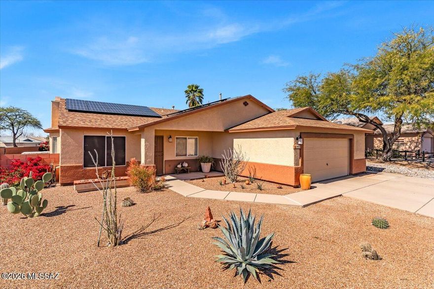 Bright and inviting 4BD/2BA Estes Cypress  home on a spacious corner lot with fantastic curb appeal! Thoughtfully designed split-bedroom floor plan plus a dedicated office that can easily convert to a 4th bedroom. The welcoming living area features a cozy fireplace for cooler evenings, beautiful tile floors, and fresh interior paint throughout. Enjoy energy savings with solar panels and a newer water heater. Step outside to a low-care backyard with nicely manicured decorative rock and a large covered patio--perfect for relaxing or entertaining. Well maintained and move-in ready--so nice you'll want to call it home the moment you walk in!