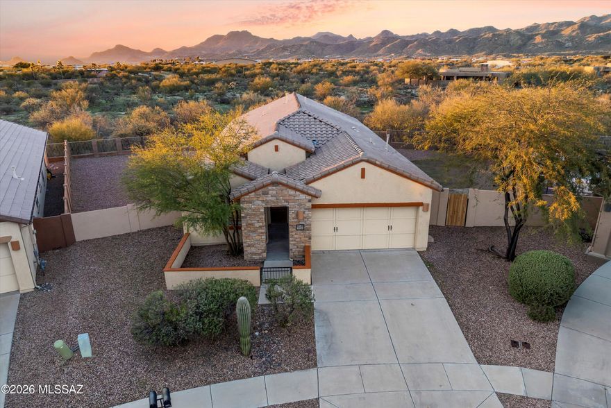 Rare Opportunity! This highly upgraded Oro Valley home sits on an oversized premium lot backing to a desert preserve. Enjoy exceptional privacy and stunning Tortolita and Catalina Mountain views. Open-concept design, ideal for everyday living and entertaining. Kitchen is bright and clean with stainless steel appliances and granite countertops. The Sovana floorplan features generous bedrooms with a versatile den (easily a 4th bedroom). Serene primary suite with luxurious bay window and spacious en-suite bathroom. Peaceful backyard to enjoy your Arizona living. Ideally located near Stone Canyon Golf Club, Vistoso Trails Nature Preserve, shopping, dining, and parks. Don't miss this exceptional opportunity in Rancho Vistoso - tour this home today!