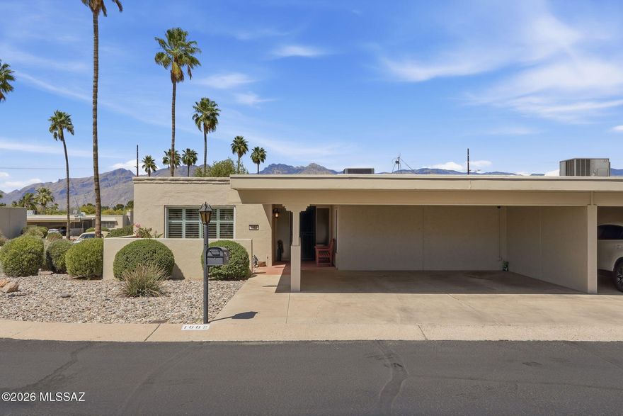 Great Location, updated, attached carport, large bedrooms, lots of natural light and a view!
This solid masonry stucco construction home is just minutes from restaurants, shopping, movies, golf & medical facilities - a fantastic location! The bedrooms are luxuriously large and have walk-in closets. The living area is spacious and versatile. The remodeled kitchen has a nice open feel and is appointed with granite counters and stainless steel appliances. The back yard is easy care and private. Enjoy sunsets, mountain views and fresh grapefruit from the covered patio.  This home is move in ready. The low HOA fee includes a pool and clubhouse.