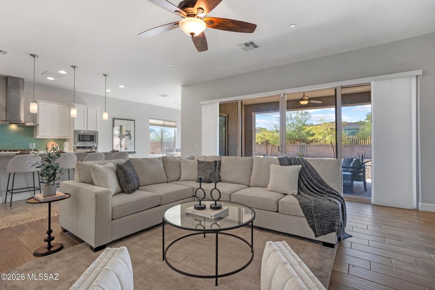 Welcome to Dove Mountain's best-kept secret.
Nestled in an exclusive enclave where homes regularly sell for $1.1-$1.6 million, this stunning Toll Brothers residence offers an extraordinary opportunity to live the Dove Mountain lifestyle at exceptional value. Whether you're seeking a full-time luxury retreat or the perfect seasonal escape, this home delivers on every level.
The private guest casita - complete with kitchenette, living room, and full bedroom suite - is a rare find. Host family for the winter, accommodate a live-in caregiver, or generate VRBO income while you're away. The flexibility is unmatched.
Inside, soaring ceilings and a dramatic wall of sliding glass doors blur the line between indoors and out, framing sweeping desert and sunset views. The chef's kitchen anchors the heart of the home with quartz countertops, a gas cooktop, stainless appliances, and a generous island - designed for the way people actually live and entertain.
Outside, a freshly refinished exterior gives this home exceptional curb appeal and true move-in-ready condition. Your 0.32-acre lot is a blank canvas - imagine a resort-style pool, an outdoor kitchen, or simply a private desert sanctuary. The space is here for it.
All of this just minutes from the five-star Ritz-Carlton, world-class golf, hiking and biking trails, and Dove Mountain's celebrated dining and recreation.
Seller is also offering an interest rate buydown - ask your agent for details.
Instant equity. Turnkey lifestyle. This is the one.