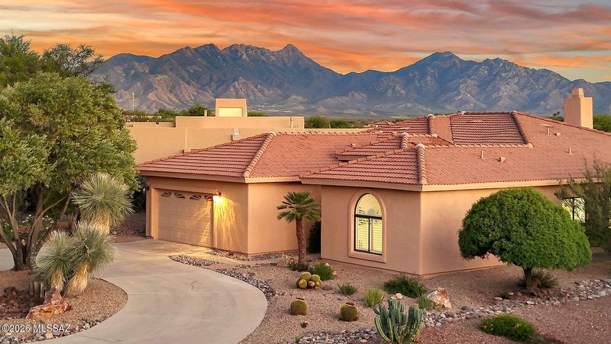 Discover the rare opportunity to embrace the ultimate desert lifestyle in this exceptional Madera Reserve residence, where breathtaking panoramas and thoughtful design converge to create an unparalleled living experience. Positioned to capture one of the most coveted settings in the community, this home showcases wide-open desert vistas dramatically framed by the majestic Santa Rita Mountains. With no homes behind you, every living space opens to this spectacular natural backdrop—a private panorama that changes with the light, from dawn's first blush to the brilliant colors of sunset across the desert sky.
The architecture celebrates Arizona's enviable climate through expansive windows lining the rear of the home, flooding interiors with natural light while island connects the living space and the kitchen, and adds ample seating for those memorable events.  The generous back patio, a masterfully designed outdoor sanctuary that invites lingering over morning coffee, sunset cocktails, and evening conversations under a canopy of stars. The generous back patio features unparalleled VIEWS and PRIVACY and invites lingering over morning coffee, sunset cocktails, and evening conversations under a canopy of stars. This is where life naturally unfolds, where distinction between inside and outside gracefully dissolves. Your primary suite is spectacular and allows you to wake up to those spectacular mountain VIEWS every morning!  The guest suite is lovely and offers plenty of space and privacy for extended stays.  A spacious den can be closed off with pocket doors to hide projects when guests arrive.  This is more than a home; it's a lifestyle of refined elegance and profound peace. Here, you're not just living near nature, you're living with it. Experience a home  where elegance and nature exist in perfect harmony!