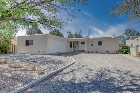 Photo of 7716 McKnight Avenue NE, Albuquerque, NM 87110 (MLS # 1108636)
