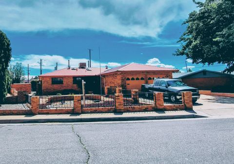 Photo of 3804 Hilton Avenue NE, Albuquerque, NM 87110 (MLS # 1102819)