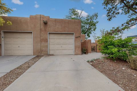 Photo of 6049 Alamosa Way NW, Albuquerque, NM 87107 (MLS # 1101196)