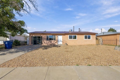 Photo of 825 59th Street NW, Albuquerque, NM 87105 (MLS # 1112093)