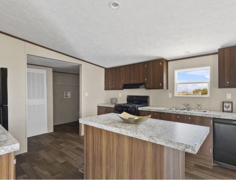 Photo of 400 Perizite Street, Belen, NM 87002 (MLS # 1096836)