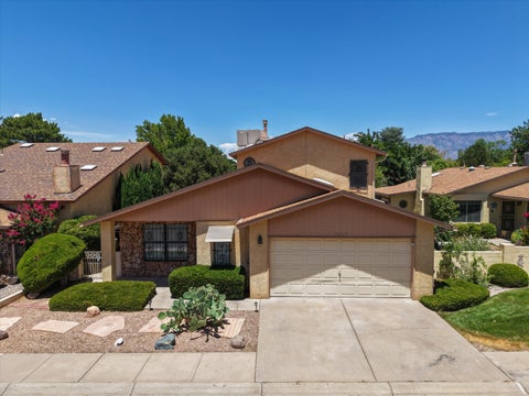 Photo of 10717 Towne Park Drive NE, Albuquerque, NM 87123 (MLS # 1107099)