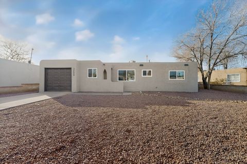 Photo of 3209 Palomas Drive NE, Albuquerque, NM 87110 (MLS # 1097145)
