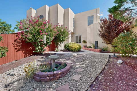 Photo of 10401 Camino Del Oso NE, Albuquerque, NM 87111 (MLS # 1108646)