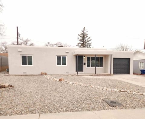 Photo of 413 Cagua Drive NE, Albuquerque, NM 87108 (MLS # 1098538)