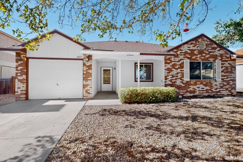 Photo of 1657 Lark Spur Drive NE, Rio Rancho, NM 87144 (MLS # 1111668)