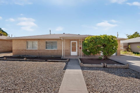 Photo of 5824 Bellamah Avenue NE, Albuquerque, NM 87110 (MLS # 1112413)