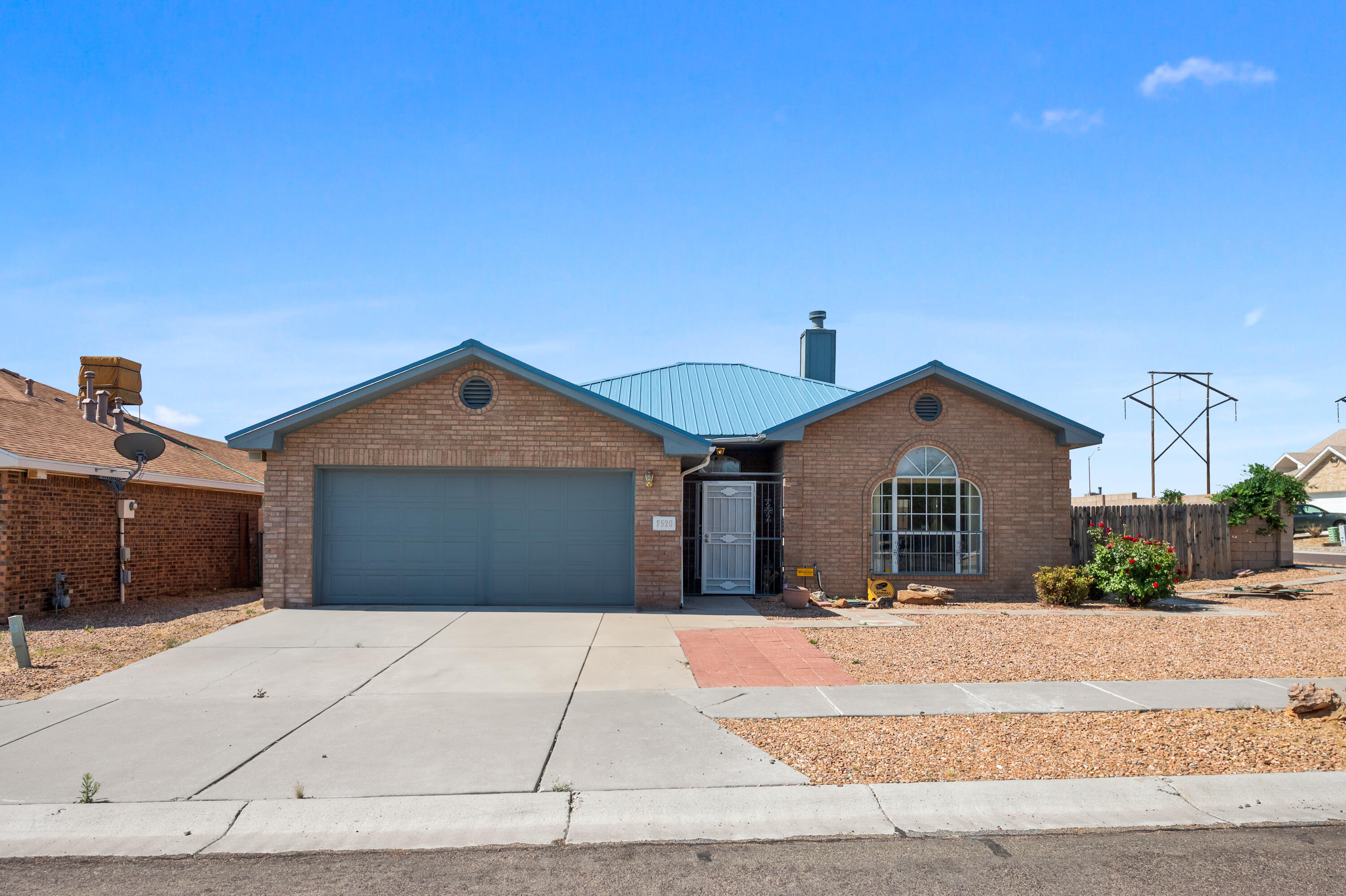 Photo 1 of 30 of 7520 La Venita Avenue NW house