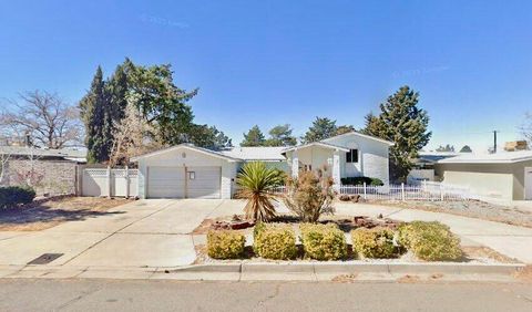 Photo of 1601 FIGUEROA Drive NE, Albuquerque, NM 87112 (MLS # 1092066)