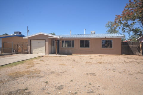 Photo of 5941 Eucariz Avenue SW, Albuquerque, NM 87121 (MLS # 1111979)