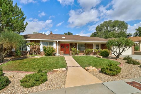 Photo of 7503 LAMPLIGHTER Lane NE, Albuquerque, NM 87109 (MLS # 1092727)