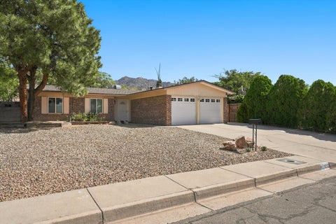 Photo of 1212 Willys Knight Drive NE, Albuquerque, NM 87112 (MLS # 1112371)