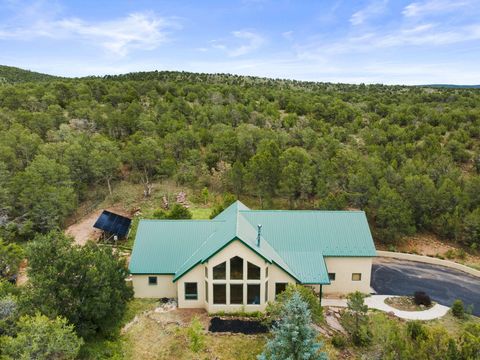 Photo of 10 HOWLIN WOLF Trail, Tijeras, NM 87059 (MLS # 1088661)