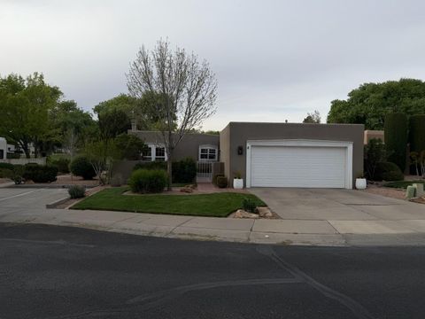 Photo of 9705 Village Green Drive NE, Albuquerque, NM 87111 (MLS # 1101177)