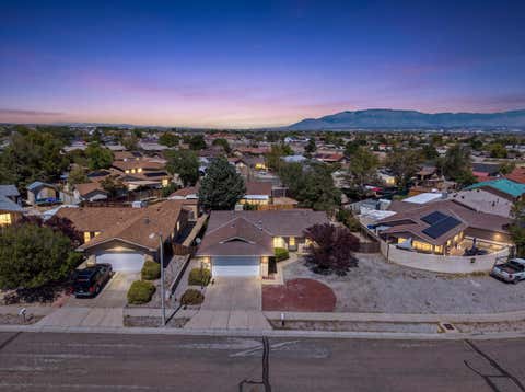 Photo of 9101 Suncrest Avenue SW, Albuquerque, NM 87121 (MLS # 1109387)