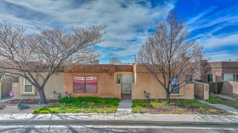 Photo of 405 Zena Lona Street NE #E, Albuquerque, NM 87123 (MLS # 1101937)