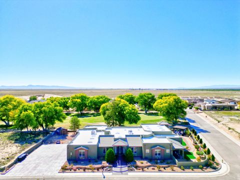Photo of 106 TRES CANTOS Ave, Rio Communities, NM 87002 (MLS # 1092579)