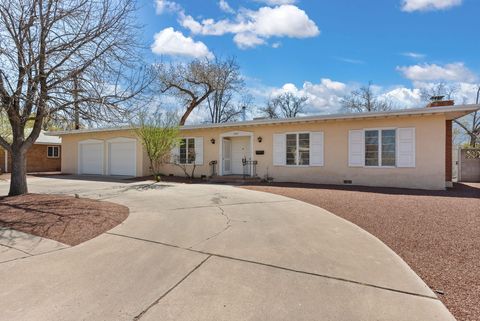 Photo of 3600 MACKLAND Avenue NE, Albuquerque, NM 87110 (MLS # 1092514)