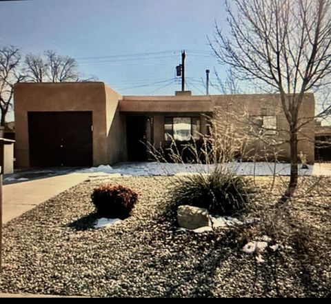 Photo of 8902 Aztec Road NE, Albuquerque, NM 87111 (MLS # 1095416)