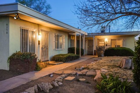 Photo of 4156 Mesa Verde Avenue NE, Albuquerque, NM 87110 (MLS # 1099315)
