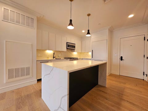Photo of 50 Leo M Birmingham Pkwy #310, Boston, MA 02135 (MLS # 73566145)
