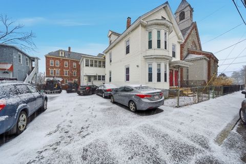 Photo of 63-65 Bowers St, Lowell, MA 01854 (MLS # 73471170)