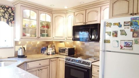 Photo of 128 Emerson Gardens #128, Lexington, MA 02420 (MLS # 73507616)