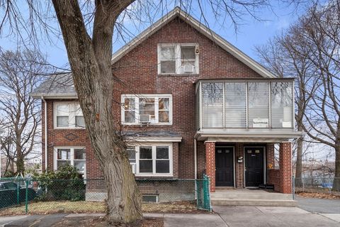 Photo of 113-115 Nottinghill Rd, Boston, MA 02135 (MLS # 73470826)