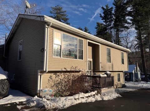 Photo of 114 Chases Grove Rd, Derry, NH 03038 (MLS # 73460131)