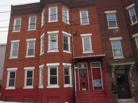 Photo of 11-13 Hampshire St, Holyoke, MA 01014 (MLS # 73477180)