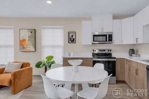 Photo of 375 Cummins Hwy #404, Boston, MA 02131 (MLS # 73510112)