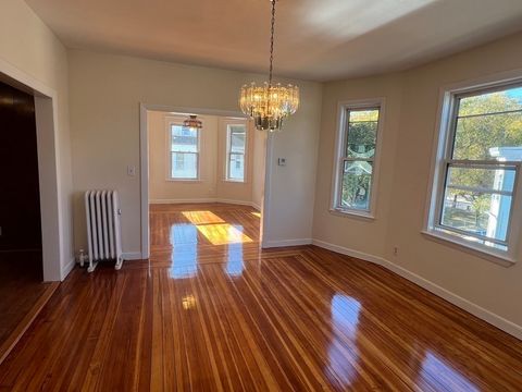 Photo of 18 Woolson St #3, Boston, MA 02126 (MLS # 73463382)