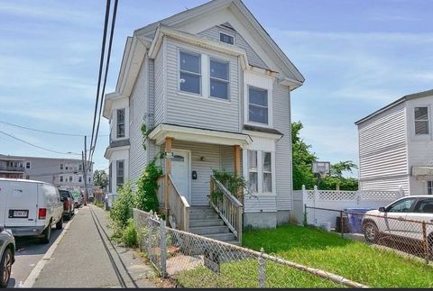 Photo of 10 Holly St, Lawrence, MA 01841 (MLS # 73462439)