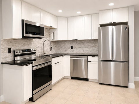 Photo of 39 Randolph Dr #39, Tewksbury, MA 01876 (MLS # 73555406)