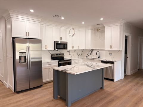 Photo of 441 Washington St #305, Dedham, MA 02026 (MLS # 73503605)