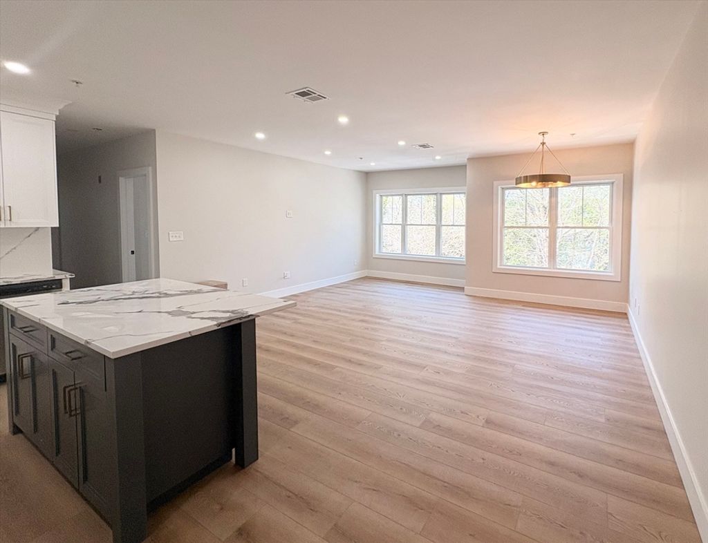 Photo of 441 Washington St #305, Dedham, MA 02026 (MLS # 73503605)