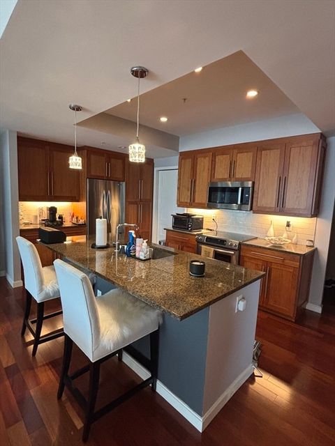 Photo of 10 Nouvelle Way #S807, Natick, MA 01760 (MLS # 73525340)