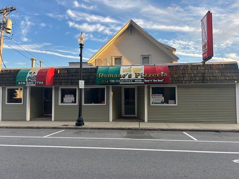 Photo of 311 Merrimack St, Lawrence, MA 01841 (MLS # 73479223)