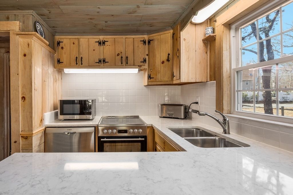 Photo of 149 Pine Grove Rd, Yarmouth, MA 02664 (MLS # 73503866)