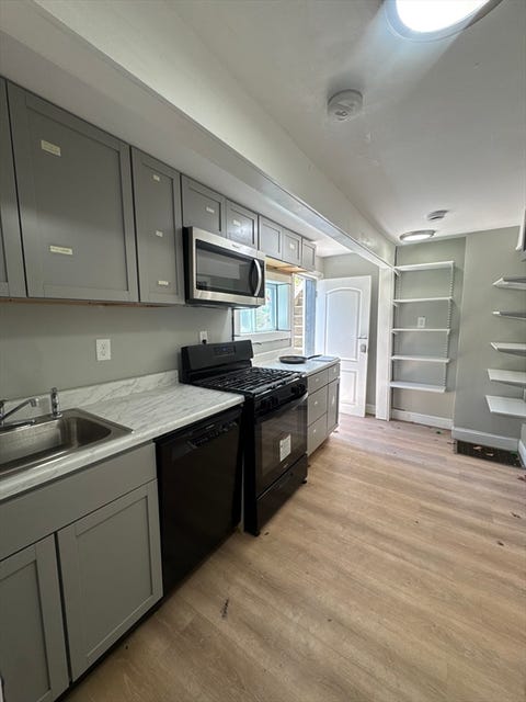 Photo of 21 Washington Ave #1, Natick, MA 01760 (MLS # 73536647)