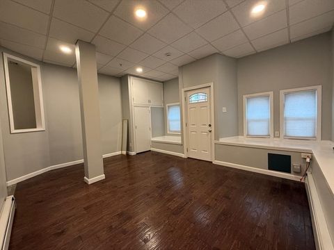 Photo of 690 Lawrence St #1, Lowell, MA 01852 (MLS # 73442207)